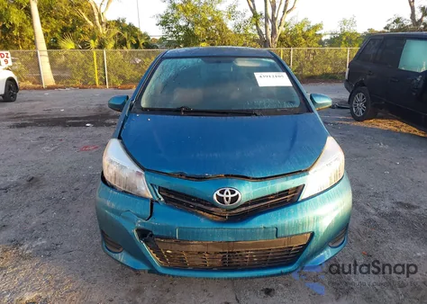 2013 Toyota Yaris Le z USA, uszkodzony, nr VIN JTDKTUD35DD557531